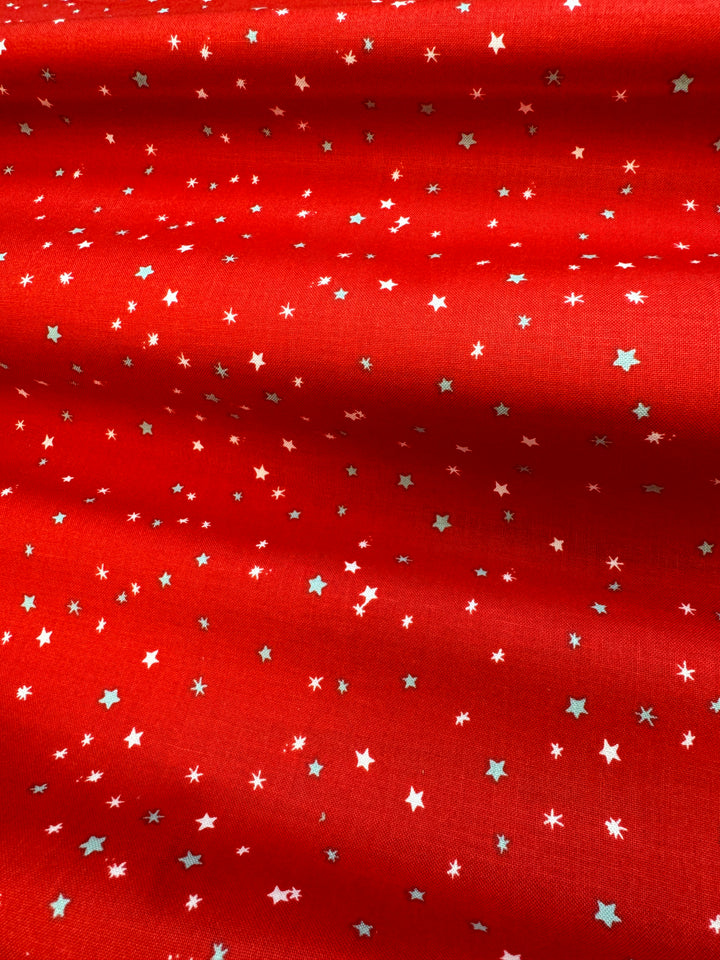 Tela roja con estrellas