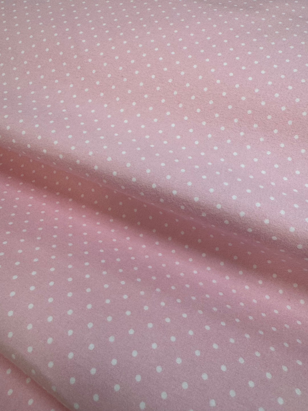 Franela rosa con puntos blancos